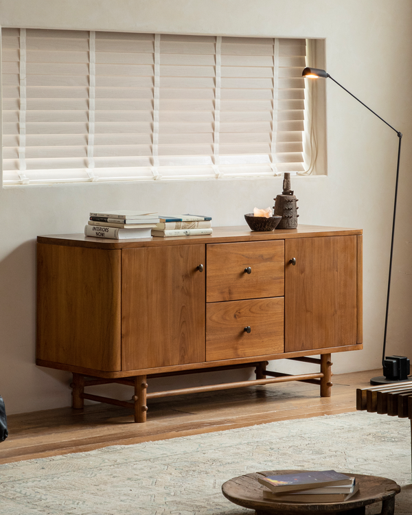 NO.121 teak sideboard with drawers and books in a cozy room setting