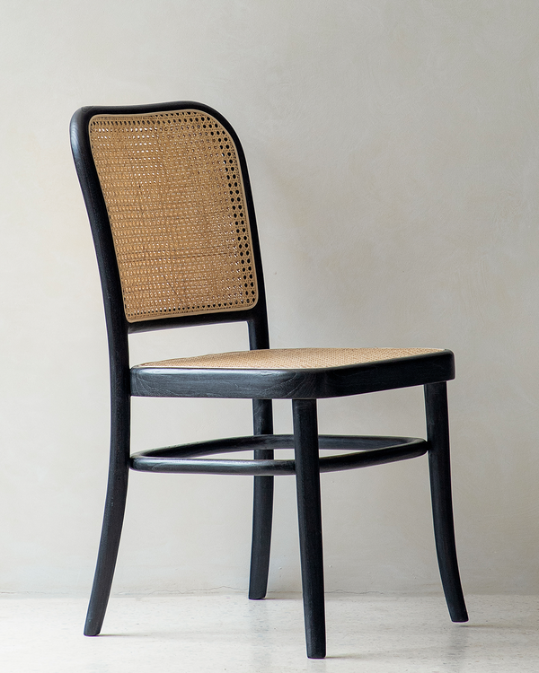 NO.811 Chair with teak frame and rattan weaving, elegant black finish.